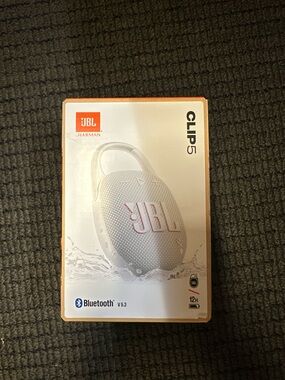 JBL Clip 5 Speaker in White with Orange Accent